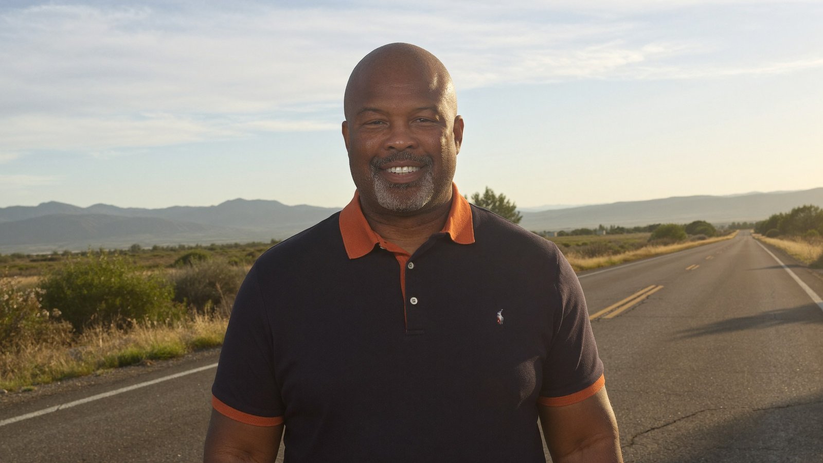 Coach Archie on an Idaho highway at golden hour